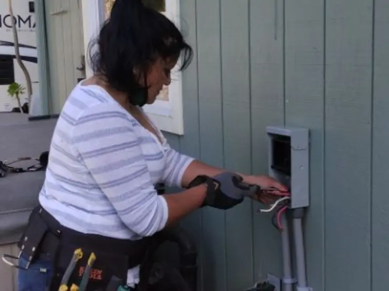 Licensed electrician wiring an exterior subpanel in Old Bridge