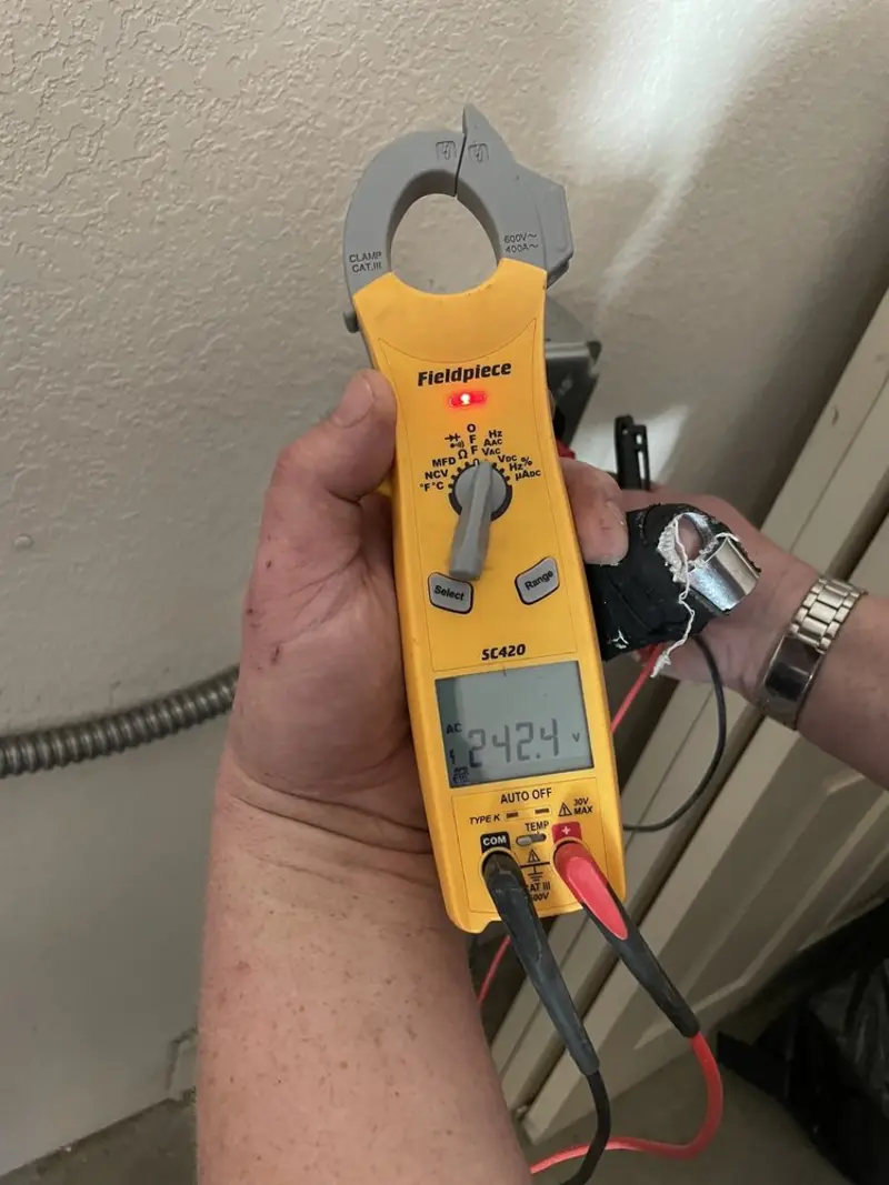 Voltage testing with clamp meter during Generator Installation in Old Bridge